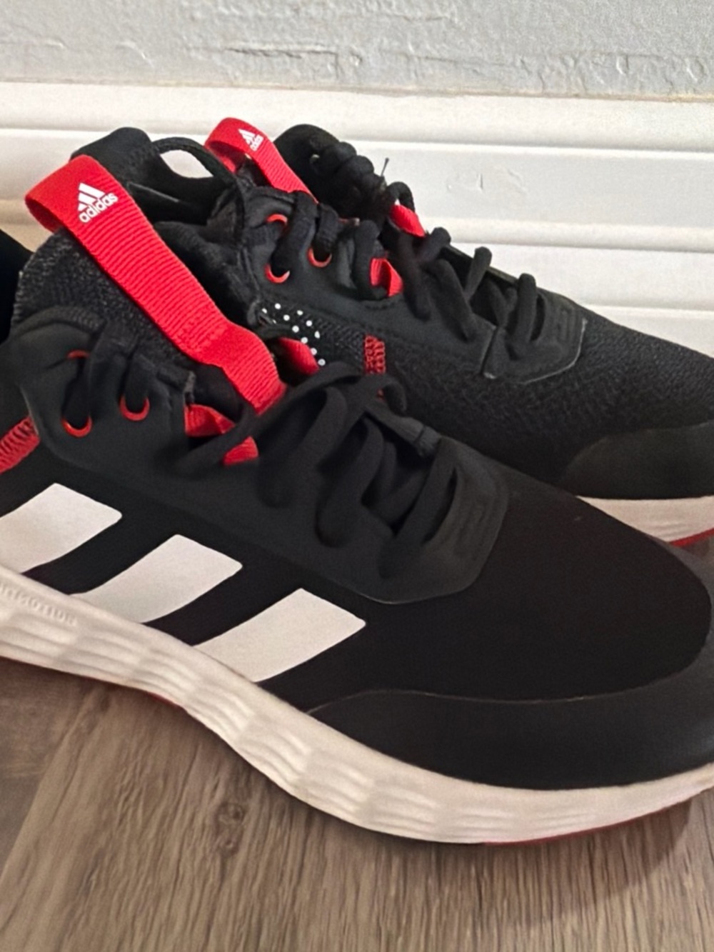 adidas Men’s Black and Red Athletic Sneakers with White Stripes